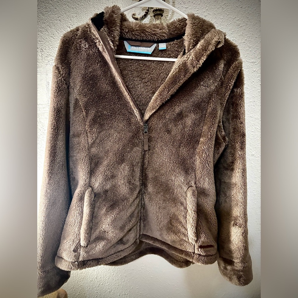 Fuzzy zip up coat. Zip up with hood